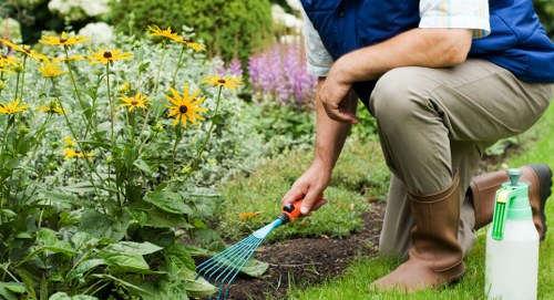 Safety signage and protective equipment at a garden site